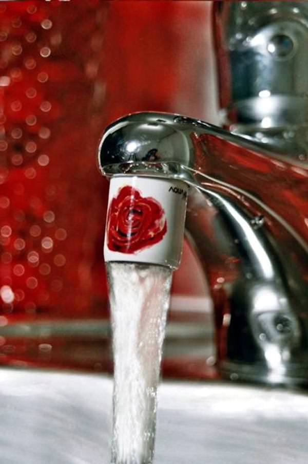 100135-4 So sieht der AquaClic am Hahn aus